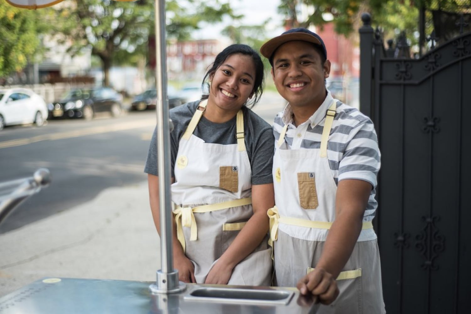 Lloyd Otruoste and wife, co-founders of #Baonanas, working at a street vendor cart